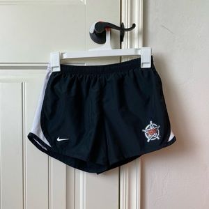 Black Nike shorts with a Oklahoma State logo on the right side.  Girls large.